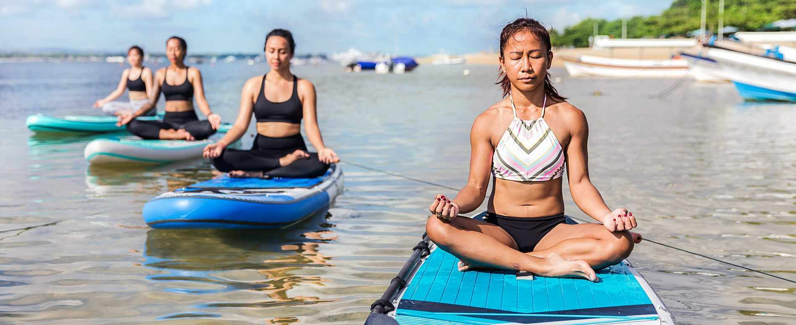 12 Paddle Board Yoga Poses You Can Do Now (with pictures) - GILI