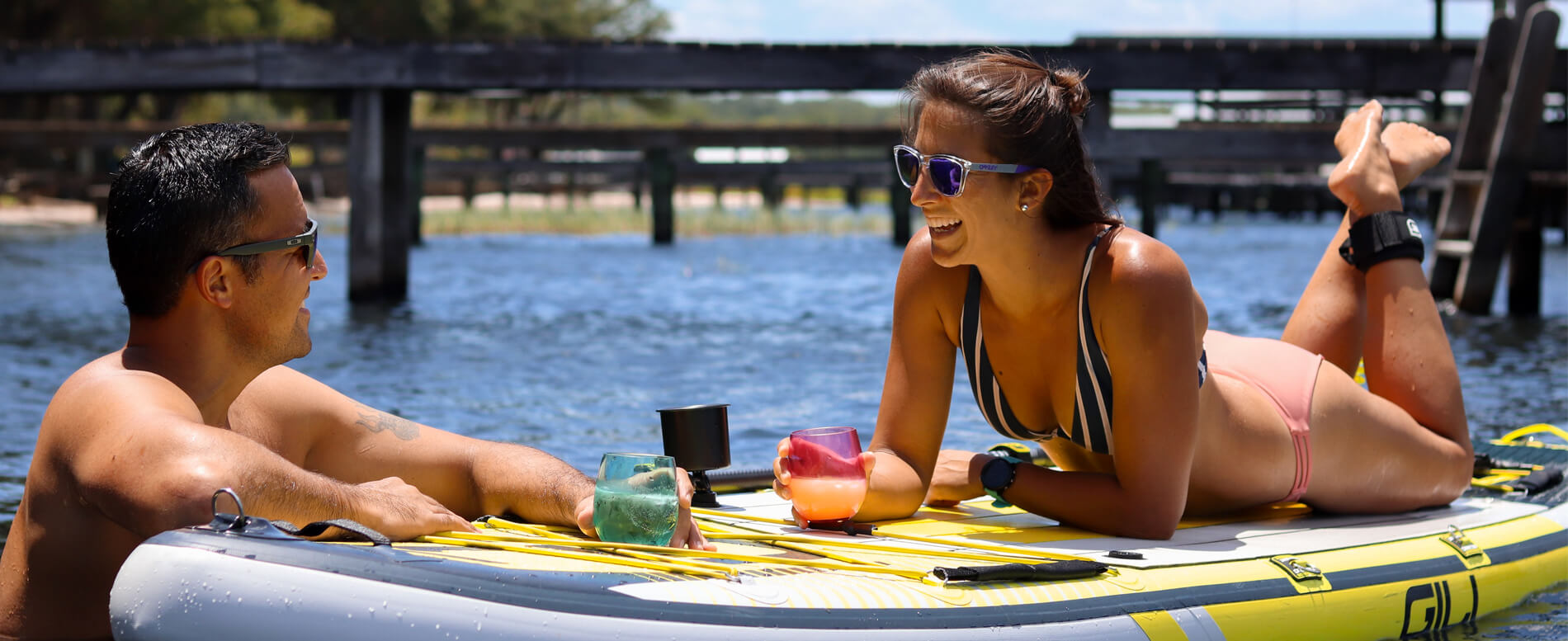 Man and a woman paddle boarding