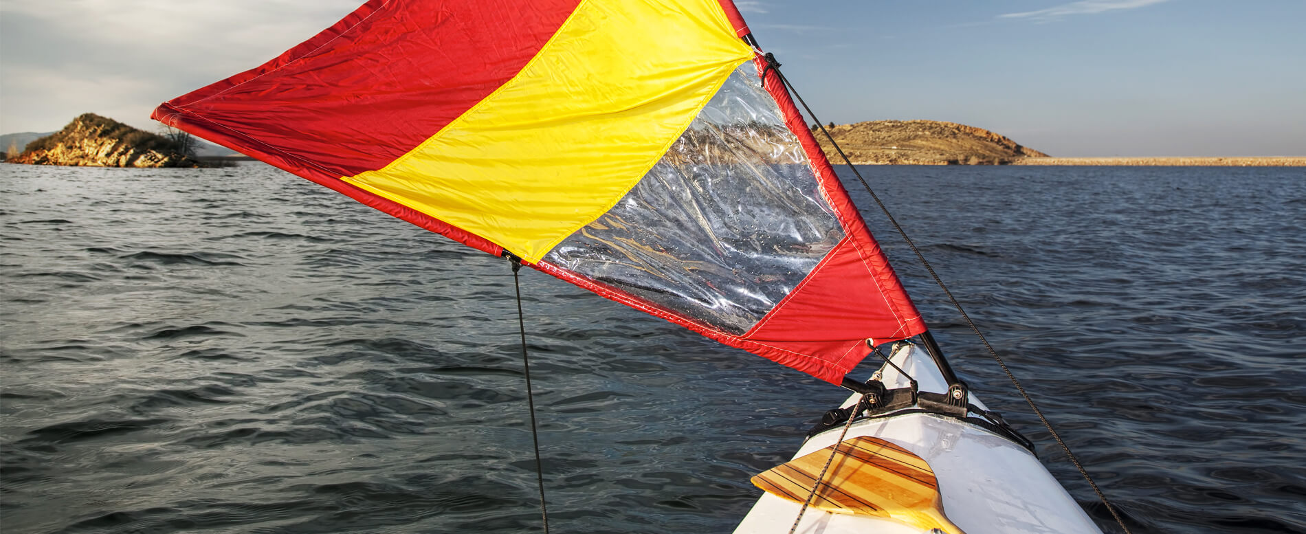 Red and yellow kayak sail