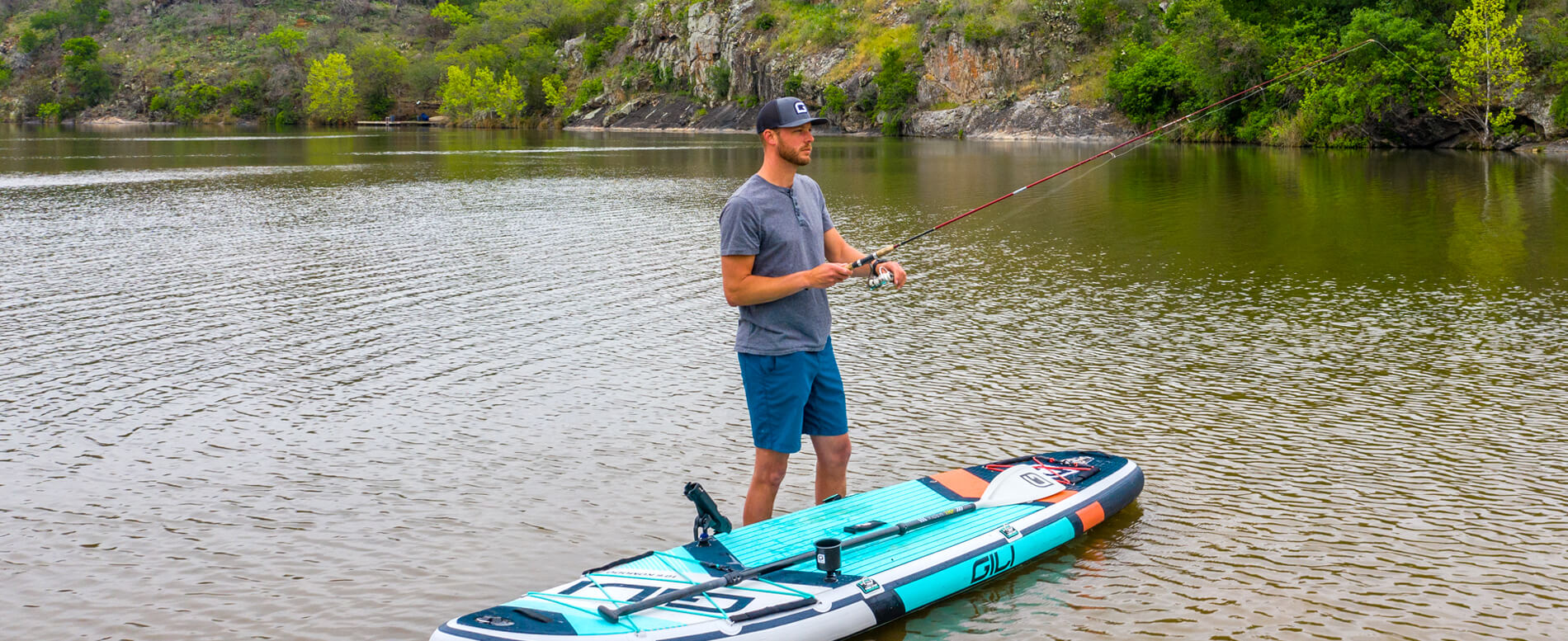 Man fishing from a paddle board