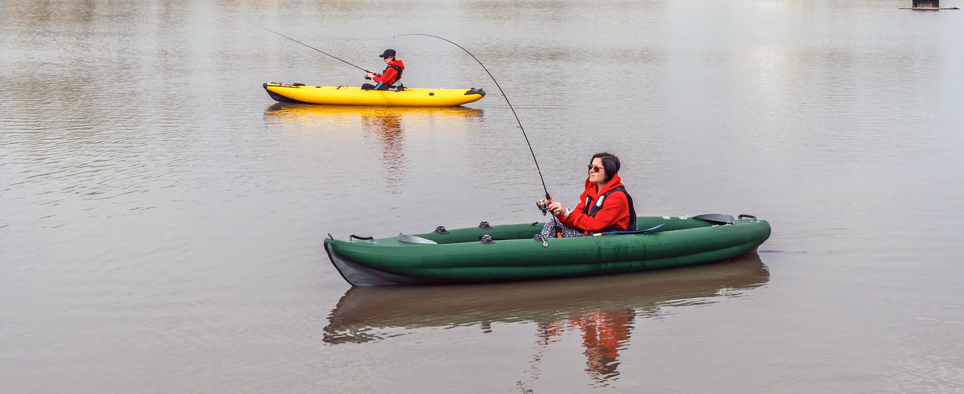 green and yellow inflatable kayak