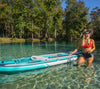 GILI Adventure inflatable paddle board Teal with Fiberglass paddle on lake